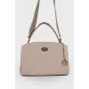 Leather bag with animal inserts