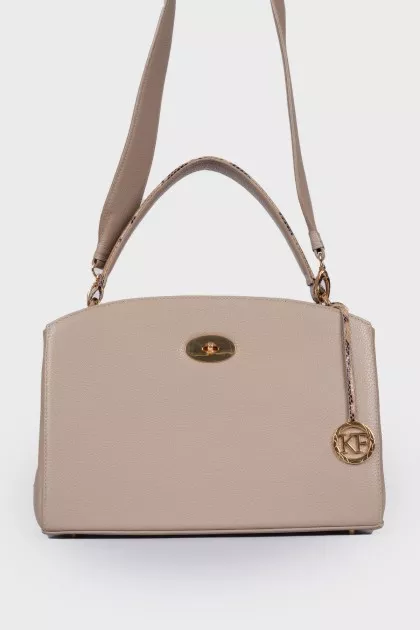 Leather bag with animal inserts