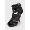 Lacquered sandals with textile inserts