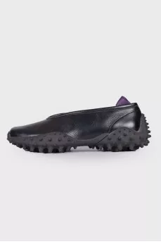 Leather sneakers with studded soles