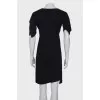 Dark blue dress with asymmetry at the bottom
