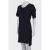 Dark blue dress with asymmetry at the bottom