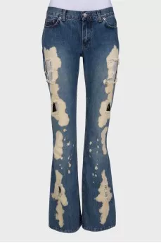 Flare jeans with distressed effect