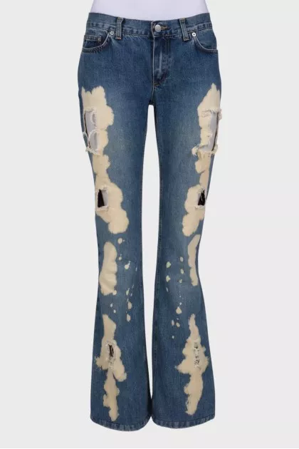 Flare jeans with distressed effect