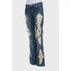 Flare jeans with distressed effect