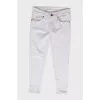 Jeans with embroidered back pocket