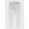 Jeans with embroidered back pocket