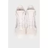 Men's sneakers with gold-tone hardware