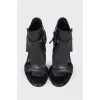 Black leather sandals with zip