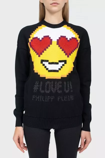 Black sweater with a big yellow smiley face