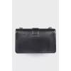 Leather black bag on a chain