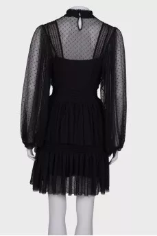 Black translucent dress with ruffles