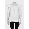 White blouse with ruffled sleeves