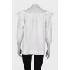 White blouse with ruffled sleeves