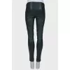 Green leather trousers