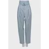 Light blue trousers with belt