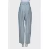 Light blue trousers with belt