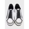 Men's black and white sneakers