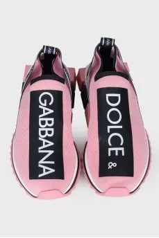 Pink textile sneakers with tag