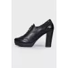 Black lace-up ankle boots