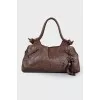 Brown bag with keychain