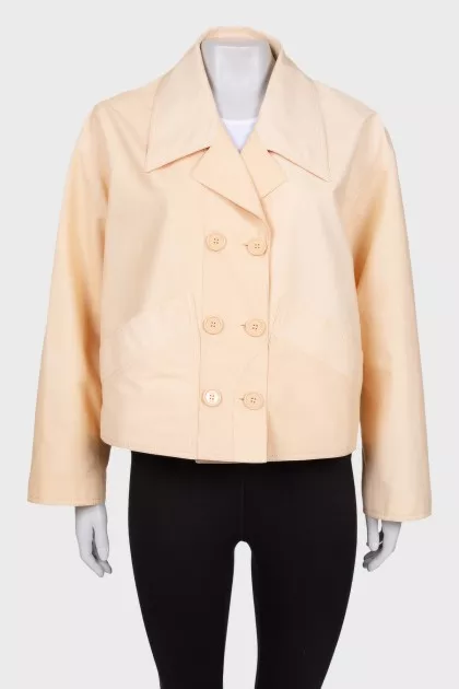 Beige windbreaker with tag