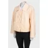 Beige windbreaker with tag