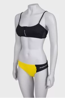 Yellow and black swimsuit with tag