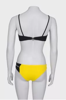 Yellow and black swimsuit with tag