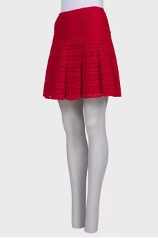 Red perforated skirt