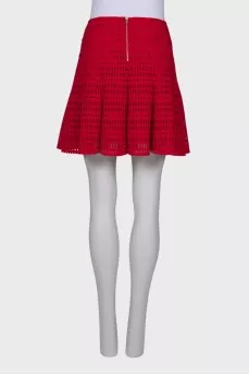 Red perforated skirt