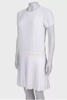 White dress with buttons on the back