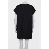 Dress with feathers on the sides