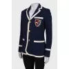 Jacket with coat of arms on the pocket