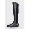 Boots in leather and textile