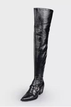 Leather over the knee boots with a strap