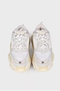 Білі кросівки Triple s