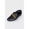 Leather loafers with golden chain
