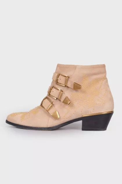 Suede cossacks with golden rhinestones