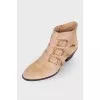 Suede cossacks with golden rhinestones