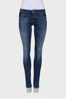 Jeans with lace inserts