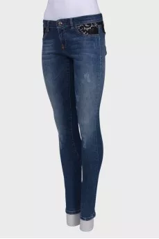 Jeans with lace inserts