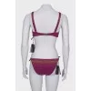 Purple swimsuit with tag