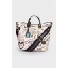 Beatrice Mural bag with tag