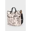 Beatrice Mural bag with tag
