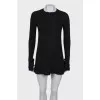 Dress with ruffles on the cuffs and hem