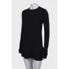 Dress with ruffles on the cuffs and hem