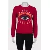 Red jumper with embroidery