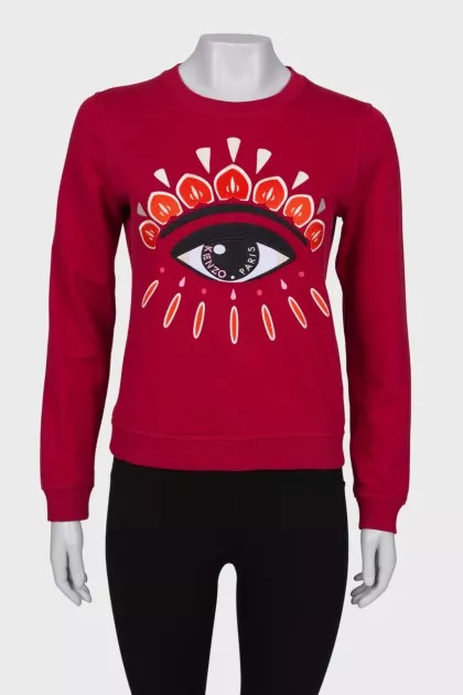 Red jumper with embroidery