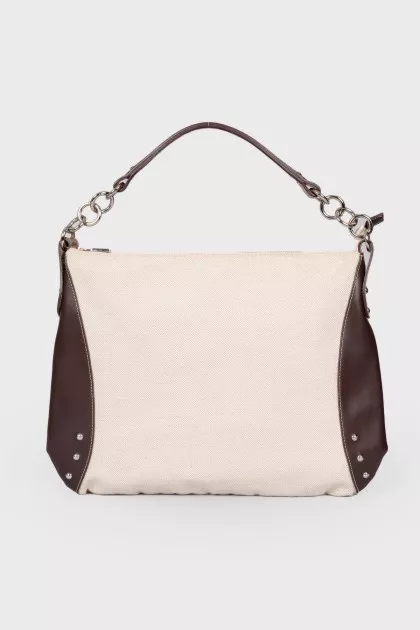 Textile and genuine leather bag